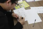 それぞれのグループ名(パーティー名)を決める様子 = 2025年3月9日 アビヤント・K